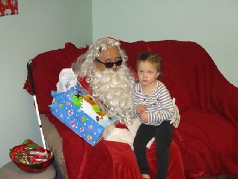 Blind Santa and a blind child